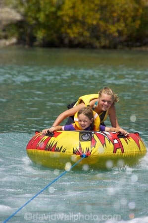 adventure;b1a5114;bannockburn;biscuiting;central;Central-Otago;child;children;dunstan;exciting;exhilaration;fast;fun;girl;girls;happy;hot;inflatable-tube;inner-tube;inner-tubing;inner_tubing;island;lake;Lake-Dunstan;lakes;leisure;N.Z.;new;new-zealand;NZ;otago;play;playing;recreation;S.I.;SI;south;South-Is;South-Is.;South-Island;speed;summer;Summertime;teenager;teenagers;thrill;Thrilling;tube;tubing;water;water-biscuit;water-sport;water-sports;watersport;watersports;wet;zealand