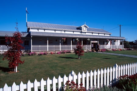 clock;flag;grass;historical-heritage;otago-central-rail-trail;picket;pickets;railways;stations;train;verandah;verandahs;visitor-information-centre
