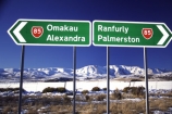 road-sign;roads;signs;mountain;-mountains;snow;cold;winter;direction;directions;rural;countryside;state-highway-85;transport;highways