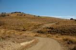 back-country;backcountry;Central-Otago;country;countryside;farm;farming;farmland;farms;field;fields;gravel-road;gravel-roads;high-altitude;high-country;highcountry;highland;highlands;Maniototo;metal-road;metal-roads;metalled-road;metalled-roads;N.Z.;New-Zealand;NZ;Old-Dunstan-Road;Old-Dunstan-Track;Old-Dunstan-Trail;Otago;remote;remoteness;road;roads;Rough-Ridge;rural;S.I.;SI;South-Is;South-Island;Sth-Is;unpaved-road;unpaved-roads;uplands