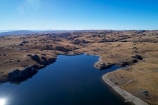 aerial;Aerial-drone;Aerial-drones;aerial-image;aerial-images;aerial-photo;aerial-photograph;aerial-photographs;aerial-photography;aerial-photos;aerial-view;aerial-views;aerials;back-country;backcountry;cabin;cabins;Central-Otago;dam;dams;Drone;Drones;fishing-cabins;fishing-camp;fishing-huts;geological;geology;high-altitude;high-country;highcountry;highlands;hut;huts;irrigation-dam;irrigation-lake;Maniototo;N.Z.;New-Zealand;NZ;Old-Dunstan-Road;Old-Dunstan-Track;Old-Dunstan-Trail;Otago;Poolburn;Poolburn-Dam;Poolburn-Lake;Poolburn-Reservoir;reflected;reflection;reflections;remote;remoteness;rock;rock-formation;rock-formations;rock-outcrop;rock-outcrops;rock-tor;rock-torr;rock-torrs;rock-tors;rocks;Rough-Ridge;S.I.;schist;schist-landscape;schist-rock;schist-rocks;SI;South-Is;South-Island;stone;unusual-natural-feature;unusual-natural-features;uplands