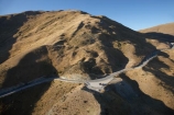 aerial;aerial-photo;aerial-photograph;aerial-photographs;aerial-photography;aerial-photos;aerial-view;aerial-views;aerials;back-country;backcountry;bend;bends;Central-Otago;corner;corners;Crown-Range;Crown-Range-Road;curve;curves;dangerous;driving;high-altitude;high-country;highcountry;highlands;highway;highways;N.Z.;New-Zealand;NZ;open-road;open-roads;Otago;Queenstown-Region;remote;remoteness;road;road-trip;roads;S.I.;SI;South-Is.;South-Island;Southern-Lakes;Southern-Lakes-District;Southern-Lakes-Region;steep;transport;transportation;travel;traveling;travelling;trip;uplands