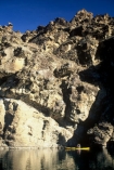 cliff;cliffs;bluff;bluffs;rock;rocks;kayak;kayaks;kayaker;kayaking;canoe;canoes;canoeing;lakes;still;stillness;calm;calmness;reflection;reflections;tranquil;tranquility;water;outcrop;outcrops;schist