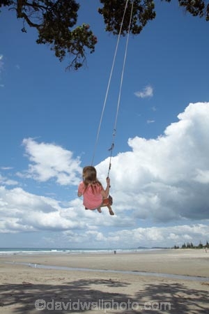 10-year-old;10-years-old;9-year-old;9-years-old;beach;beaches;child;children;coast;coastal;Coromandel;Coromandel-Peninsula;fun;girl;girls;happy;joy;kid;kids;kiwi-icon;kiwi-icons;kiwiana;little-girl;little-girls;N.I.;N.Z.;New-Zealand;NI;nine-year-old;nine-years-old;North-Is;North-Is.;North-Island;NZ;outdoor;outside;people;person;play;playing;Pohutukawa-Tree;Pohutukawa-Trees;rope-swing;rope-swings;shore;summer;swing;swinging;swings;ten-year-old;ten-years-old;Waihi-Beach;Waikato;young-girl;young-girls