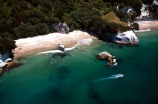 aerials;beach;beaches;boat;boating;cave;caves;cliff;cliffs;erosion;outcrop;rock-outcrop;rocky-formation;sand;sandstone;sea-cave;seascape;seascapes;tor;tors;tourism;water;waterfront