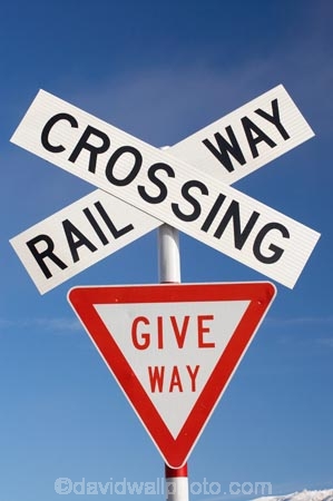 cross;crosses;give-way-sign;level-crossing;level-crossings;Middlemarch;N.Z.;New-Zealand;NZ;Otago;rail;rail-crossing;rail-crossings;railroad;railroads;railway;railway-crossing;railway-crossings;railways;S.I.;SI;sign;signage;signs;South-Is.;South-Island;Strath-Taieri;Sutton;tracks;train;trains;transport;transportation;twilight;warning;warning-sign;warning-signs;x