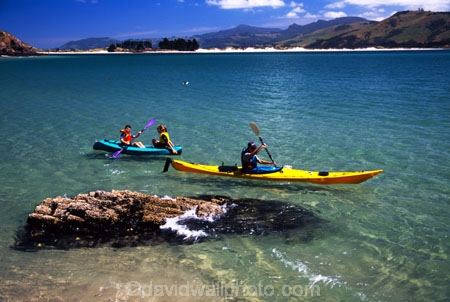 kayak;kayaks;canoe;canoes;canoeing;paddle;paddling;yellow;blue;sea;ocean;people;water