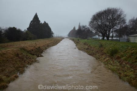 bad-weather;brook;brooks;country;countryside;creek;creeks;deluge;dike;dikes;dirty;dirty-water;Dunedin;dyke;dykes;embankment;embankments;flood;flood-bank;flood-banks;flood-water;flood-waters;floodbank;floodbanks;flooding;floods;floodwater;floodwaters;flow;high-water;inundate;levee;levees;meadow;meadows;Mosgiel;N.Z.;New-Zealand;NZ;on-flood;Otago;paddock;paddocks;pasture;pastures;rural;S.I.;SI;Silver-Stream;Silverstream;South-Is.;South-Island;stopbank;stopbanks;stream;streams;swollen-river;Taieri;Taieri-Plain;Taieri-Plains;water;waterway;waterways;weather;wet