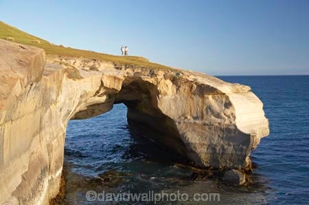 arch;arches;bluff;bluffs;cliff;cliffs;coast;coastal;coastline;coastlines;coasts;couple;Dunedin;formation;geological;geology;N.Z.;Natural-Arch;Natural-Arches;New-Zealand;NZ;Ocean;Oceans;Otago;Pacific-Ocean;people;person;rock;rock-formation;rock-formations;S.I.;sea;shore;shoreline;shorelines;shores;SI;South-Island;steep;stone;Tunnel-Beach