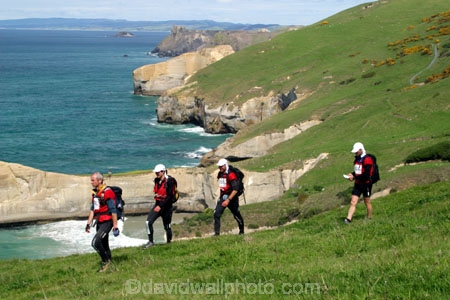Southern-Traverse;Southern-Traverse-2003;Southern-Traverse-Adventure-Race;Dunedin;Otago;New-Zealand;Team-Omnigraphics;Omnigraphics;Sponsor;Sponsored;athlete;athletes;endure;endurance;stamina;challenge;effort;marathon;long-distance;long_distance;team;teams;team-member;team-members;team_member;team_members;compete;competing;competition;competitor;competitors;race;racing;cliff;cliffs;bluff;bluffs;high;steep;coast;coastal;water;sea;ocean;wave;waves;tide;tidal;tide;grass;grassy;walk;walking;tramp;tramping;tramper;trampers;hike;hiking;hiker;hikers;sandstone;sedimentary;rock;rocks;rocky;beach;beaches;shore;sea-shore;seashore;sea_shore;foreshore;shore-line;shoreline;shore_line