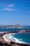 Karitane;Otago;coast;beach;beaches;water;wave;waves;ocean;sea;rural;town;settlement;curve;grass;green;tree;trees;blue;sky;summer;sunny