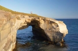 arch;arches;bluff;bluffs;cliff;cliffs;coast;coastal;coastline;coastlines;coasts;couple;Dunedin;formation;geological;geology;N.Z.;Natural-Arch;Natural-Arches;New-Zealand;NZ;Ocean;Oceans;Otago;Pacific-Ocean;people;person;rock;rock-formation;rock-formations;S.I.;sea;shore;shoreline;shorelines;shores;SI;South-Island;steep;stone;Tunnel-Beach