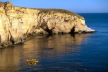 bluff;bluffs;calm;cliff;kayak;ocean;reflection;sea;waikouaiti;water