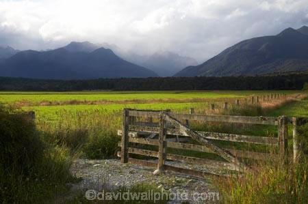 agricultural;agriculture;black-cloud;black-clouds;cloud;cloudy;country;countryside;dark-cloud;dark-clouds;farm;farming;Farmland;farms;fence;fenceline;fencelines;fences;field;fields;Fiordland;Fiordland-N.P;Fiordland-National-Park;Fiordland-NP;gate;gates;gateway;gateways;grey-cloud;grey-clouds;Manapouri;meadow;meadows;mountain;mountains;N.Z.;national-park;national-parks;New-Zealand;NZ;paddock;paddocks;pasture;pastures;peak;peaks;rain-cloud;rain-clouds;range;ranges;rural;S.I.;SI;South-Island;south-west-new-zealand-world-heritage-area;Southland;storm;storm-clouds;storms;stormy;te-wahipounamu;te-wahipounamu-south_west-new-zealand-world-heritage-area;world-heirtage-site;world-heritage-area