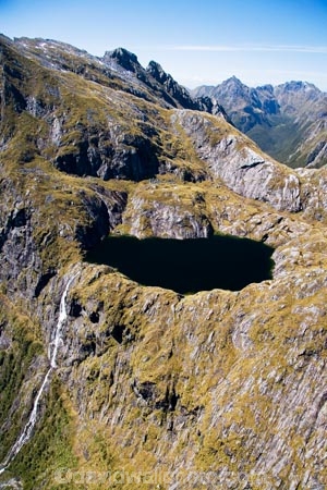 aerial;aerial-photo;aerial-photography;aerial-photos;aerial-view;aerial-views;aerials;alp;alpine;alps;altitude;bluff;bluffs;cascade;cascades;cliff;cliffs;creek;creeks;Delta-Burn;falls;Fiordland;Fiordland-N.P;Fiordland-National-Park;Fiordland-NP;high;high-altitude;Kepler-Mountains;lake;lakes;mount;mountain;mountain-lake;mountain-lakes;mountainous;mountains;mountainside;mountainsides;mt;mt.;N.Z.;national-park;national-parks;natural;nature;New-Zealand;NZ;peak;peaks;range;ranges;S.I.;scene;scenic;SI;Small-Lake;South-Island;south-west-new-zealand-world-heritage-area;Southland;steep;stream;streams;summit;summits;tarn;tarns;te-wahi-pounamu;te-wahipounamu;te-wahipounamu-south_west-new-zealand-world-heritage-area;water;water-fall;water-falls;Waterfall;waterfalls;wet;world-heirtage-site;world-heirtage-sites;world-heritage-area;world-heritage-areas