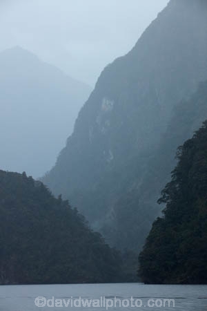 bad-weather;black-cloud;black-clouds;bluff;bluffs;cliff;cliffs;cloud;clouds;cloudy;dark-cloud;dark-clouds;Doubtful-Sound;fiord;Fiordland;Fiordland-N.P.;Fiordland-National-Park;Fiordland-NP;fiords;fjord;fjords;flooded-glacial-valley;glacial-valley;glaciated-valley;gray;gray-cloud;gray-clouds;grey;grey-cloud;grey-clouds;monochromatic;monochrome;N.Z.;national-park;national-parks;New-Zealand;NZ;Patea;rain;rain-cloud;rain-clouds;raining;rainy;S.I.;SI;South-IS;South-Island;Southland;Sth-Is;Te-Waipounamu;Te-Waipounamu-World-Heritage-Site;tonal;tone;tones;UN-world-heritage-area;UN-world-heritage-site;UNESCO-World-Heritage-area;UNESCO-World-Heritage-Site;united-nations-world-heritage-area;united-nations-world-heritage-site;weather;world-heritage;world-heritage-area;world-heritage-areas;World-Heritage-Park;World-Heritage-site;World-Heritage-Sites