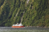 boat;boats;bush;coast;coastal;coastline;color;colors;colour;colours;cruise;cruises;fiord;fiordland-national-park;fiords;fjord;fjords;forest;forests;grandeur;green;launch;launches;majestic;majesty;Milford-Sound;moss;mountainside;mountainsides;native-bush;natural;nature;New-Zealand;red-boat;red-boats;scene;scenery;scenic;sound;sounds;South-Island;south-west;te-wahipounamu-south_west-new;te-waihipounamusouth-west-new;tour-boat;tour-boats;tourism;tourist;tourist-boat;tourist-boats;tourists;trees;water;world-heritage-area