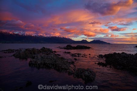 alpenglo;alpenglow;alpine;alpinglo;alpinglow;break-of-day;calm;cloud;clouds;coast;coastal;coastline;coastlines;coasts;color;colors;colour;colours;dawn;dawning;daybreak;first-light;Kaikoura;Kaikoura-Coast;Kaikoura-Range;Kaikoura-Ranges;Marlborough;morning;mountain;mountainous;mountains;mt;New-Zealand;NZ;ocean;oceans;orange;Pacific-Ocean;pink;placid;quiet;reflected;reflection;reflections;S.I.;sea;seas;Seaward-Kaikoura-Range;Seaward-Kaikoura-Ranges;serene;shore;shoreline;shorelines;shores;smooth;snow;South-Is;South-Island;Sth-Is;still;sunrise;sunrises;sunup;tranquil;twilight;water