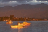 boat;boats;calm;calmness;coast;coastal;coastline;coastlines;coasts;dawn;early-light;early-morning;fishing-boat;fishing-boats;Kaikoura;Kaikoura-Coast;Marlborough;N.Z.;New-Zealand;NZ;ocean;oceans;Pacific-Ocean;S.I.;sea;Seaward-Kaikoura-Range;Seaward-Kaikoura-Ranges;shore;shoreline;shorelines;shores;SI;South-Island;still;stillness;water
