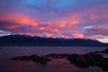 alpenglo;alpenglow;alpine;alpinglo;alpinglow;break-of-day;calm;cloud;clouds;coast;coastal;coastline;coastlines;coasts;color;colors;colour;colours;dawn;dawning;daybreak;first-light;Kaikoura;Kaikoura-Coast;Kaikoura-Range;Kaikoura-Ranges;Marlborough;morning;mountain;mountainous;mountains;mt;New-Zealand;NZ;ocean;oceans;orange;Pacific-Ocean;pink;placid;quiet;reflected;reflection;reflections;S.I.;sea;seas;Seaward-Kaikoura-Range;Seaward-Kaikoura-Ranges;serene;shore;shoreline;shorelines;shores;smooth;snow;snow-capped;snowy;South-Is;South-Island;Sth-Is;still;sunrise;sunrises;sunup;tranquil;twilight;water