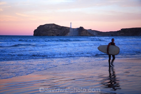 beach;beaches;surfing;surf;surfers;surf-board;coastal;coast;sunset;dusk;pink;light-house;light-houses;lighthouse;lighthouses;promointory