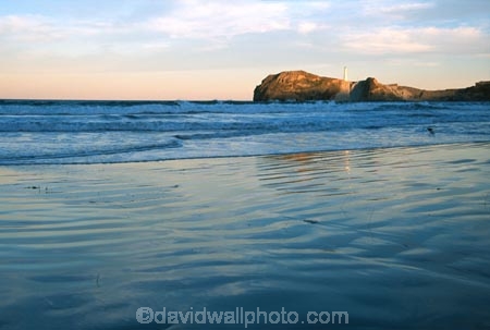 light-house;lighthouses;light-houses;lighthouse;coast;coastline;coastal;shoreline;shore;beach;beaches;headland;promontory;pastel;pastels;pink;sunset;dusk;Castle-Point-Lighthouse;Wairarapa;North-Island;Pacific;ocean;castlepoint