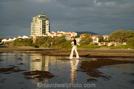 black-cloud;black-clouds;calm;cloud;clouds;cloudy;coast;coastal;coastline;coastlines;coasts;dark-cloud;dark-clouds;foreshore;girl;girls;grey-cloud;grey-clouds;high-rise;high-rises;high_rise;high_rises;highrise;highrises;Kapiti-Coast;N.Z.;New-Zealand;North-Is;North-Is.;North-Island;NZ;Paraparaumu;Paraparaumu-Beach;people;person;placid;quiet;rain-cloud;rain-clouds;reflection;reflections;serene;shore;shoreline;shorelines;shores;smooth;still;tranquil;water;woman;women