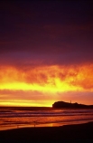 light-house;lighthouses;light-houses;lighthouse;coast;coastline;coastal;shoreline;shore;beach;beaches;headland;promontory;color;colour;colors;colours;orange;dawn;sunrise;Castle-Point-Lighthouse;Wairarapa;North-Island;Pacific;ocean
