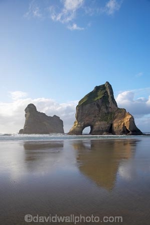 archway;Archway-Is;Archway-Is.;Archway-Island;Archway-Islands;archways;beach;beaches;calm;coast;coastal;coastline;foreshore;geological;geology;N.Z.;Nelson-Region;New-Zealand;North-West-Nelson-Region;NZ;placid;quiet;reflection;reflections;rock;rock-archway;rock-archways;rock-formation;rock-formations;rock-outcrop;rock-outcrops;rock-tor;rock-torr;rock-torrs;rock-tors;rocks;S.I.;sand;sandy;serene;shore;shoreline;SI;smooth;South-Is.;South-Island;still;stone;Tasman-Sea;tranquil;water;Wharariki-Beach