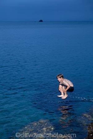 boy;boys;child;children;coast;coastal;coastline;coastlines;coasts;Doubtless-Bay;dusk;evening;foreshore;fun;jump;jumping;Karikari-Peninsula;kid;kids;little-boy;little-boys;N.I.;N.Z.;New-Zealand;NI;night;night-time;North-Is;North-Is.;North-Island;Northland;NZ;ocean;Parakerake-Bay;play;playing;sea;shore;shoreline;shorelines;shores;twilight;water;Whatuwhiwhi