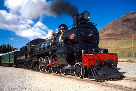 train;steam;trains;historic;historical;rail;carriage;smoke;old;cow-catcher;wheels;tourism;tourist;tourists;excursion;boiler;coal;railway;track;tracks