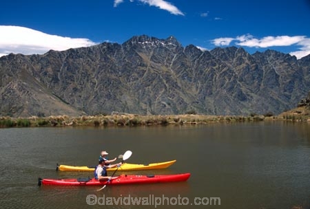 kayak;kayaks;kayaker;kayakers;water;paddle;paddler;paddlers;paddling;paradise;beautiful;lakes;lake;adventure;adventure-tourism;recreation;outdoors;outdoor;outside;relax;relaxing;yellow;boat;pristine;summer;holiday;holidays;vacation;vacations;deer-park-heights;deer-park;the-remarkables;remarkables;queenstown;south-island;new-zealand;tarn;tarns;pond;ponds;sea-kayak;sea-kayaks;red;two;pair;mountain;mountains