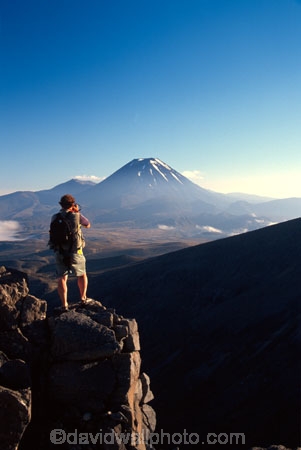 cloud;cone;crater;craters;environment;figure;fog;man;mist;misty;mountain;mystery;nature;peak;peaks;person;photographer;slope;slopes;snow;spectator;sunrise;volcanic;volcano