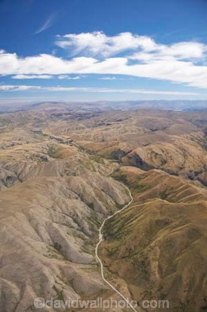 aerial;aerial-photo;aerial-photography;aerial-photos;aerials;agricultural;agriculture;barren;contours;country;countryside;dry;erroded;farm;farming;farmland;farms;High-Country;highland;highlands;Highway-8;hills;hilly;Lindis-Pass;N.Z.;New-Zealand;NZ;Otago;road;rough;rugged;rural;South-Island;State-Highway-8;topography;wild;wilderness
