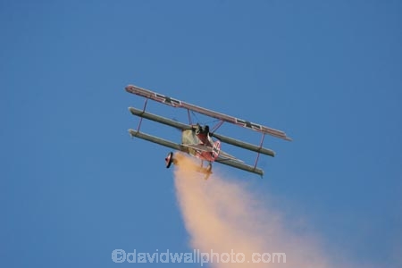 warbirds-over-wanaka;warbird;warbirds;wanaka;south-island;new-zealand;nz;airshow;airshows;air-show;air-shows;demonstration;display;displays;air-display;air-displays;flight;flights;fly;flying;flyer;flyers;aviator;aviators;aviation;aviating;pilot;pilots;plane;planes;aeroplane;aeroplanes;airplane;airplanes;aircraft;air-craft;combat;military;airforce;air-force;war;wars;world-war-one;WWI;world-war-1;ww1;sky;propellor;fighter;fighters;fighter-plane;fighter-planes;biplane;biplanes;1917;1918;Fokker-Dr.1-Triplane;triplane;triplanes;fokker;fokkers;red-barron;manfred-von-richthofen;germany;german;smoke-trail;smoke-trails;vapour-trail;vapour-trails