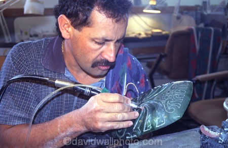 art;artwork;carving;concentrate;concentration;create;creating;creation;creative;detail;details;drill;drilling;drills;industry;maori;Ngai-Tahu;tourism;work;working;workshop