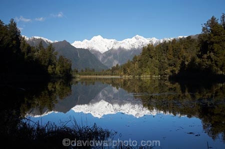 alp;alpine;alps;altitude;Aoraki;Aoraki-Mount-Cook;Aoraki-Mt-Cook;Aoraki-Mt.-Cook;calm;high-altitude;lake;Lake-Matheson;lakes;main-divide;mount;Mount-Cook;Mount-Tasman;mountain;mountain-peak;mountainous;mountains;mountainside;mt;Mt-Cook;Mt-Tasman;mt.;Mt.-Cook;Mt.-Tasman;N.Z.;New-Zealand;NZ;peak;peaks;placid;quiet;range;ranges;reflection;reflections;S.I.;serene;SI;smooth;snow;snow-capped;snow_capped;snowcapped;snowy;South-Is.;South-Island;South-West-New-Zealand-World-Heritage-Area;southern-alps;still;summit;summits;Te-Poutini-National-Park;Te-Wahipounamu;tranquil;water;West-Coast;Westland;Westland-National-Park;World-Heritage-Area