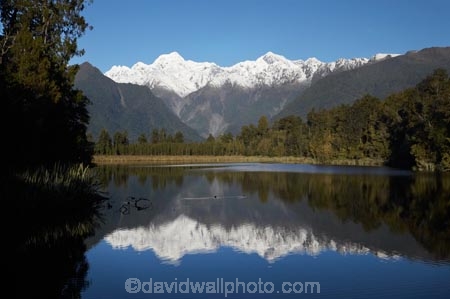 alp;alpine;alps;altitude;Aoraki;Aoraki-Mount-Cook;Aoraki-Mt-Cook;Aoraki-Mt.-Cook;calm;high-altitude;lake;Lake-Matheson;lakes;main-divide;mount;Mount-Cook;Mount-Tasman;mountain;mountain-peak;mountainous;mountains;mountainside;mt;Mt-Cook;Mt-Tasman;mt.;Mt.-Cook;Mt.-Tasman;N.Z.;New-Zealand;NZ;peak;peaks;placid;quiet;range;ranges;reflection;reflections;S.I.;serene;SI;smooth;snow;snow-capped;snow_capped;snowcapped;snowy;South-Is.;South-Island;South-West-New-Zealand-World-Heritage-Area;southern-alps;still;summit;summits;Te-Poutini-National-Park;Te-Wahipounamu;tranquil;water;West-Coast;Westland;Westland-National-Park;World-Heritage-Area