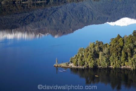 adventure;adventure-tourism;aerial;aerial-photo;aerial-photograph;aerial-photographs;aerial-photography;aerial-photos;aerial-view;aerial-views;aerials;boat;boats;calm;canoe;canoeing;canoes;kayak;kayaker;kayakers;kayaking;kayaks;lake;Lake-Mapourika;lakes;N.Z.;New-Zealand;NZ;paddle;paddler;paddlers;paddling;placid;quiet;reflection;reflections;S.I.;sea-kayak;sea-kayaker;sea-kayakers;sea-kayaking;sea-kayaks;serene;SI;smooth;South-Is.;South-Island;South-West-New-Zealand-World-Heritage-Area;still;Te-Poutini-National-Park;Te-Wahipounamu;tranquil;water;West-Coast;Westland;westland-national-park;World-Heritage-Area