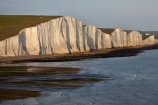 afternoon-light;bluff;bluffs;Britain;British-Isles;chalk-cliff;chalk-cliffs;chalk-downland;chalk-downlands;chalk-downs;chalk-formation;chalk-formations;chalk-headland;chalk-headlands;chalk-layer;chalk-layers;cliff;cliffs;coast;coastal;coastline;coastlines;coasts;Cretaceous-chalk-layer;Cuckmere-Beach;Cuckmere-Haven;down;downland;downlands;downs;East-Sussex;England;English;English-Chanel;eroded;erosion;Europe;foreshore;formation;formations;G.B.;GB;geological;geological-formation;geological-formations;geology;Great-Britain;image;images;late-light;layer;layering;layers;limestone;low-tide;low-tides;natural;natural-landscape;natural-landscapes;ocean;oceans;photo;photos;rock-formation;rock-formations;S.E.-England;SE-England;sea;Seaford;seas;sedimentary-layer;sedimentary-layers;Seven-Sisters;Seven-Sisters-Chalk-Cliffs;Seven-Sisters-Cliffs;Seven-Sisters-Country-Park;shore;shoreline;shorelines;shores;South-Downs;South-Downs-N.P.;South-Downs-National-Park;South-Downs-NP;South-East-England;Southern-England;steep;stone;strata;stratum;Sussex;The-Seven-Sisters;tidal;tide;tides;U.K.;UK;United-Kingdom;unusual-natural-feature;unusual-natural-features;unusual-natural-formation;unusual-natural-formations;water;white-chalk-cliff;white-chalk-cliffs;White-Cliff;white-cliffs