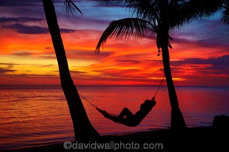 coast;coastal;coastline;coastlines;coasts;coconut-palm;coconut-palm-tree;coconut-palm-trees;coconut-palms;Coral-Coast;dusk;evening;female;Fij;Fiji-Islands;foreshore;hammock;hammocks;Korotogo;nightfall;ocean;orange;Pacific;Pacific-Ocean;palm;palm-tree;palm-trees;palms;sea;shore;shoreline;shorelines;shores;Sigatoka;silhouette;silhouettes;sky;South-Pacific;sunset;sunsets;tropical-island;tropical-islands;twilight;Viti-Levu;Viti-Levu-Island;water;woman;women