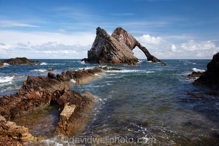Banffshire;Bow-Fiddle-Rock;Britain;British-Isles;coast;coastal;coastline;coastlines;coasts;foreshore;G.B.;GB;geological;geology;Great-Britain;island;islands;large-sea-arch;Moray;Moray-Firth;natural-arch;natural-arches;natural-bridge;natural-bridges;natural-geological-formation;natural-geological-formations;North-Sea;northeast-Scotland;ocean;Portknockie;quartzite-rock;rock;rock-arch;rock-arches;rock-formation;rock-formations;rock-outcrop;rock-outcrops;rock-tor;rock-torr;rock-torrs;rock-tors;rocks;rocky;Scotland;sea;sea-arch;sea-arches;shore;shoreline;shorelines;shores;stone;U.K.;UK;United-Kingdom;unusual-natural-feature;unusual-natural-features;unusual-natural-formation;unusual-natural-formations;water