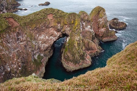 Aberdeenshire;bluff;bluffs;Britain;British-Isles;Buchan;Bullers-of-Buchan;cave;cavern;caverns;caves;cliff;cliffs;coast;coastal;coastline;coastlines;coasts;eroded;erosion;formation;formations;G.B.;GB;geological;geological-formation;geological-formations;geology;Great-Britain;grotto;grottos;littoral-cave;littoral-caves;natural;natural-arch;natural-arches;natural-bridge;natural-bridges;natural-geological-formation;natural-geological-formations;natural-landscape;natural-landscapes;Peterhead;roch-arches;rock;rock-arch;rock-arches;rock-formation;rock-formations;rocks;Scotland;sea-arch;sea-arches;sea-cave;sea-caves;stone;U.K.;UK;United-Kingdom;unusual-natural-feature;unusual-natural-features