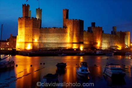Afon-Seiont;battlement;battlements;boat;boats;Britain;British-Isles;building;buildings;Caernarfon;Caernarfon-Castle;calm;Carnarvon;Carnarvon-Castle;Castell-Caernarfon;castellated;castellations;castle;castles;crenellation;crenellations;Cymru;dark;dusk;Dymar-dre;evening;flood-lighting;flood-lights;flood-lit;flood_lighting;flood_lights;flood_lit;floodlighting;floodlights;floodlit;fort;fortification;fortress;fortresses;G.B.;GB;Great-Britain;Gwynedd;heritage;historic;historic-building;historic-buildings;historical;historical-building;historical-buildings;history;light;lights;medieval-castle;medieval-castles;night;night-time;night_time;old;placid;quiet;reflection;reflections;River-Seiont;serene;smooth;still;stone-buidling;stone-building;stone-buildings;tradition;traditional;tranquil;twilight;U.K.;UK;UN-world-heritage-site;UNESCO-World-Heritage-Site;United-Kingdom;united-nations-world-heritage-site;Wales;water;Welsh-Castle;Welsh-Castles;Welsh-Flag;Welsh-flags;world-heritage;World-Heritage-Park;World-Heritage-site;World-Heritage-Sites