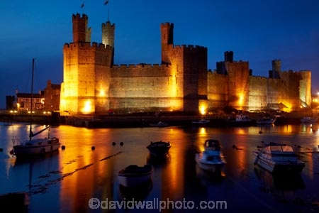 Afon-Seiont;battlement;battlements;boat;boats;Britain;British-Isles;building;buildings;Caernarfon;Caernarfon-Castle;calm;Carnarvon;Carnarvon-Castle;Castell-Caernarfon;castellated;castellations;castle;castles;crenellation;crenellations;Cymru;dark;dusk;Dymar-dre;evening;flood-lighting;flood-lights;flood-lit;flood_lighting;flood_lights;flood_lit;floodlighting;floodlights;floodlit;fort;fortification;fortress;fortresses;G.B.;GB;Great-Britain;Gwynedd;heritage;historic;historic-building;historic-buildings;historical;historical-building;historical-buildings;history;light;lights;medieval-castle;medieval-castles;night;night-time;night_time;old;placid;quiet;reflection;reflections;River-Seiont;serene;smooth;still;stone-buidling;stone-building;stone-buildings;tradition;traditional;tranquil;twilight;U.K.;UK;UN-world-heritage-site;UNESCO-World-Heritage-Site;United-Kingdom;united-nations-world-heritage-site;Wales;water;Welsh-Castle;Welsh-Castles;Welsh-Flag;Welsh-flags;world-heritage;World-Heritage-Park;World-Heritage-site;World-Heritage-Sites