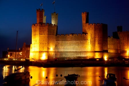Afon-Seiont;battlement;battlements;boat;boats;Britain;British-Isles;building;buildings;Caernarfon;Caernarfon-Castle;calm;Carnarvon;Carnarvon-Castle;Castell-Caernarfon;castellated;castellations;castle;castles;crenellation;crenellations;Cymru;dark;dusk;Dymar-dre;evening;flood-lighting;flood-lights;flood-lit;flood_lighting;flood_lights;flood_lit;floodlighting;floodlights;floodlit;fort;fortification;fortress;fortresses;G.B.;GB;Great-Britain;Gwynedd;heritage;historic;historic-building;historic-buildings;historical;historical-building;historical-buildings;history;light;lights;medieval-castle;medieval-castles;night;night-time;night_time;old;placid;quiet;reflection;reflections;River-Seiont;serene;smooth;still;stone-buidling;stone-building;stone-buildings;tradition;traditional;tranquil;twilight;U.K.;UK;UN-world-heritage-site;UNESCO-World-Heritage-Site;United-Kingdom;united-nations-world-heritage-site;Wales;water;Welsh-Castle;Welsh-Castles;Welsh-Flag;Welsh-flags;world-heritage;World-Heritage-Park;World-Heritage-site;World-Heritage-Sites