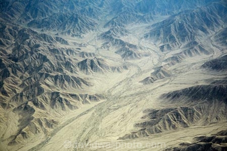 Andean-Mountains;aerial;aerial-image;aerial-images;aerial-photo;aerial-photograph;aerial-photographs;aerial-photography;aerial-photos;aerial-view;aerial-views;aerials;Andean-foothills;Andes;Andes-foothills;Andes-Mountains;Andes-Range;arid;barren;desert;deserts;dry;dry-river;dry-riverbed;dry-riverbeds;dry-stream-bed;eroded;erosion;geology;hill;hills;Ica-Region;Latin-America;mountains;Peru;Peruvian-Andes;Peruvian-Desert;Republic-of-Peru;riverbed;South-America;Sth-America;waterway;waterways;weathered