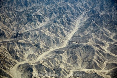 Andean-Mountains;aerial;aerial-image;aerial-images;aerial-photo;aerial-photograph;aerial-photographs;aerial-photography;aerial-photos;aerial-view;aerial-views;aerials;Andean-foothills;Andes;Andes-foothills;Andes-Mountains;Andes-Range;arid;barren;desert;deserts;dry;dry-river;dry-riverbed;dry-riverbeds;dry-stream-bed;eroded;erosion;geology;hill;hills;Ica-Region;Latin-America;mountains;Peru;Peruvian-Andes;Peruvian-Desert;Republic-of-Peru;riverbed;South-America;Sth-America;waterway;waterways;weathered