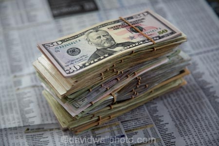 American-dollar;American-dollars;bank;banks;bill;bills;bundle-of-cash;business;cash;commerce;dollar;dollars;exchange;exchange-rate;finance;finances;financial;financial-page;financial-pages;financial-report;financial-reports;foreign-currency;foreign-exchange;foreign-money;foreign-notes;international-currency;international-money;international-travel;mountain-of-money;newspaper;newspapers;note;notes;overseas-travel;paper-currency;paper-money;piles-of-cash;piles-of-money;rate;rich;stock-report;stock-reports;tourism;travel;travelling;United-States-Dollar;United-States-Dollars;US-dollar;US-dollars;US;USD;wad-of-cash;wad-of-currency;wad-of-notes;wealth