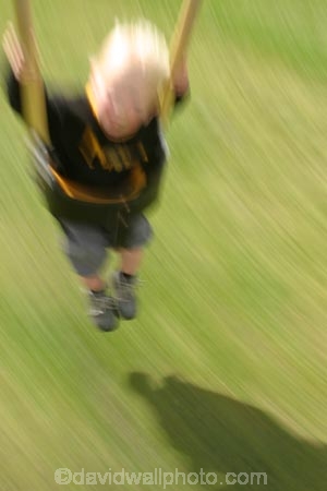 swing;swings;swinging;boy;little;child;children;toddler;infant;toddlers;infants;play;playing;playground;play_ground;play-ground;playgrounds;play_grounds;play-grounds;speed;blurr;blurred;blurry;fast;motion;zoom;zoomed;zooms;zooming;grass;green;grassy;outdoor;outdoors;outside;playtime;fun;moving;movement;childhood;happiness;happy;joy;kid;kids